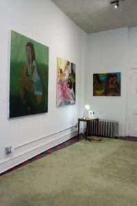 Photo Of Gallery, Three Paintings In Situ With Found Object Installation On Green Rug
