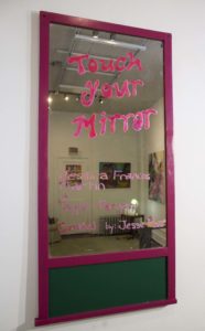 Photo Of Mirror With Exhibition Title